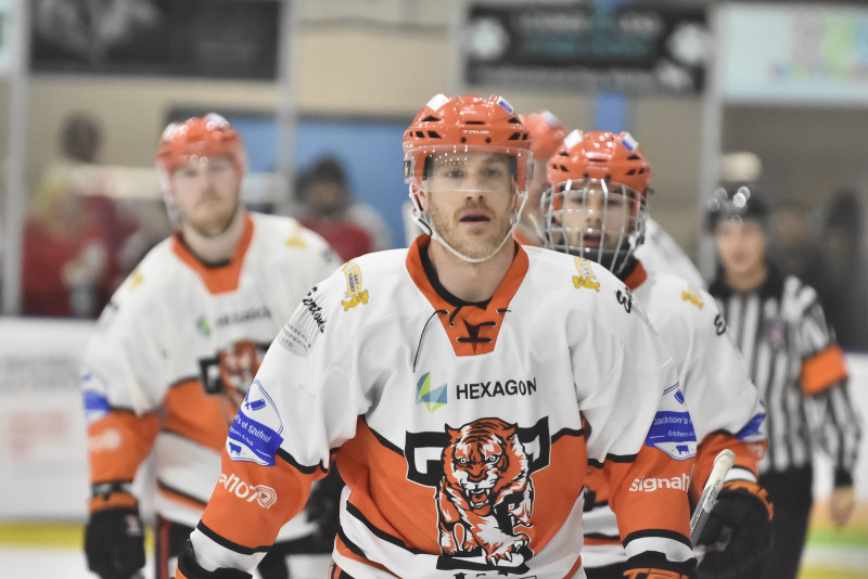 Jason Silverthorn heads to the bench after scoring for the Tigers. Photo: Steve Brodie