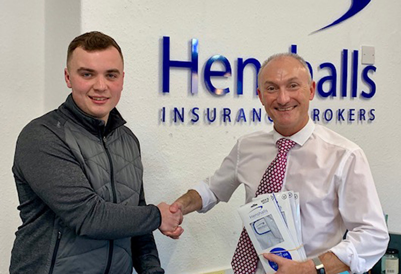Upcoming golfer Dani Hoof from Newport with Martin Pitchford from Henshalls Insurance Brokers