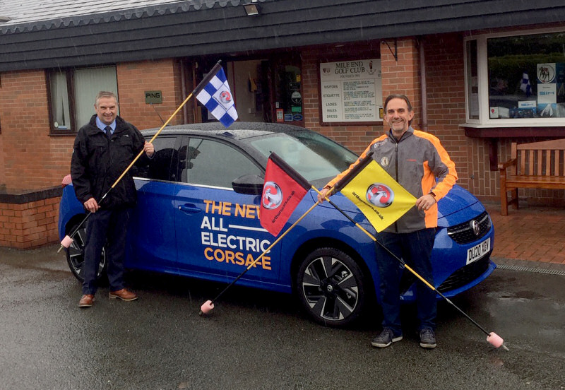 Craig Huxley, Arthurs Motor Group and Richard Thompson, Mile End Golf Club celebrate the arrival of the club’s new Tee Flags in the new Vauxhall All Electric Corsa-E
