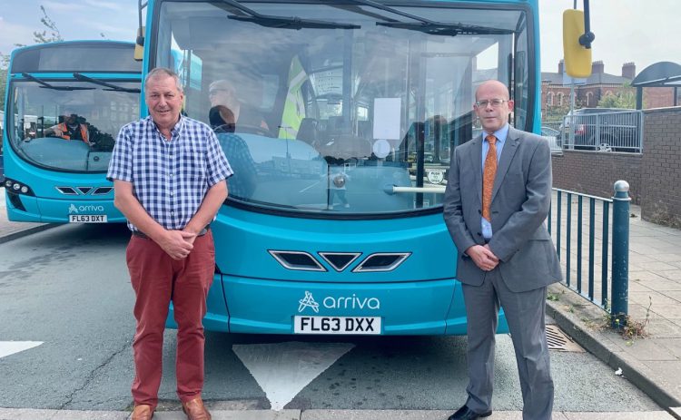 Councillor Steve Davenport, and Councillor Steve Mason with one of the 401 buses. Photo: Shropshire Council