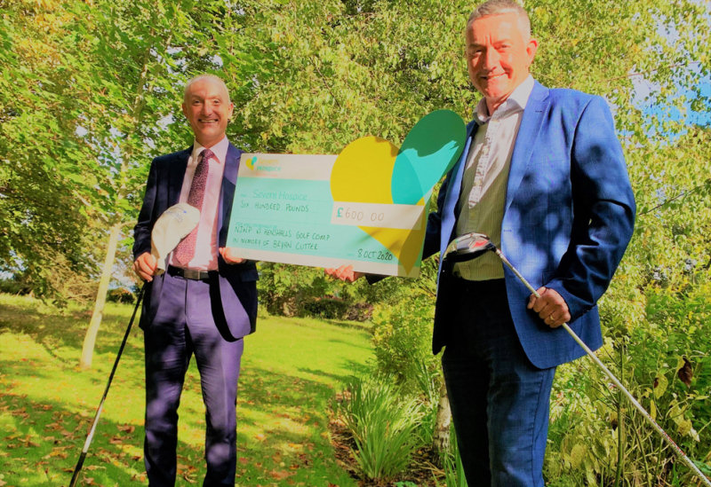 Martin Pitchford from Henshalls and Nick Jones from Nick Jones Wealth Planning with the cup