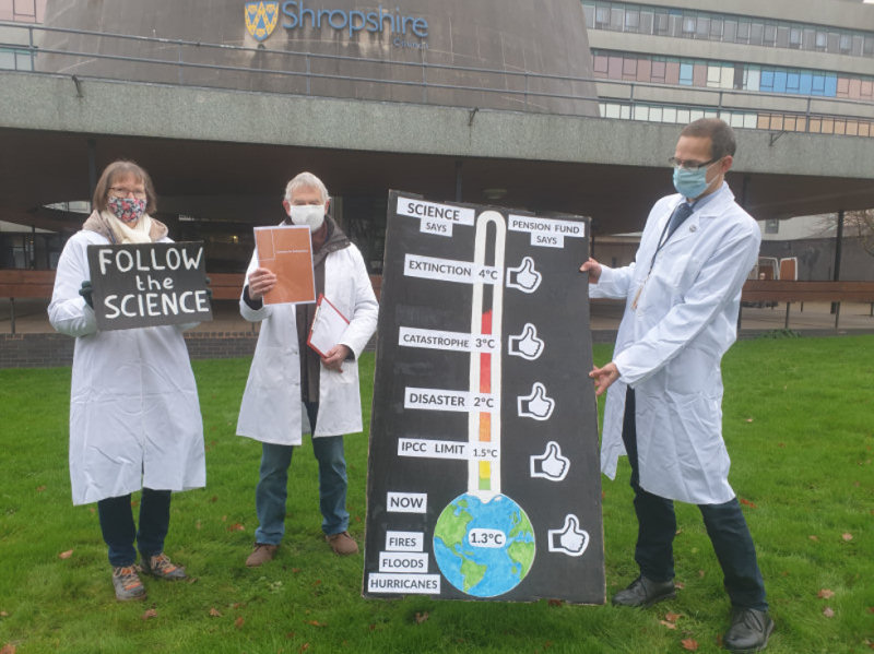Fossil Free Shropshire demonstrated outside Shirehall dressed as scientists in order to highlight a controversial new report from the Shropshire County Pension Fund.