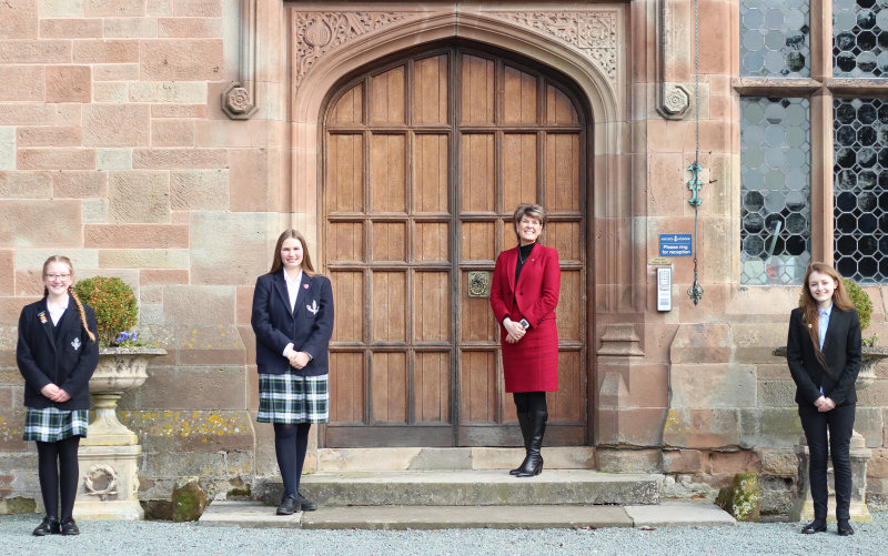Headmistress Diane Browne pictured with Adcote students