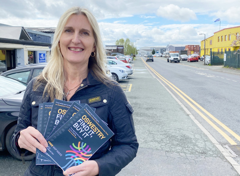 Oswestry BID’s Adele Nightingale with samples of ‘Oswestry – Find It, Buy it’