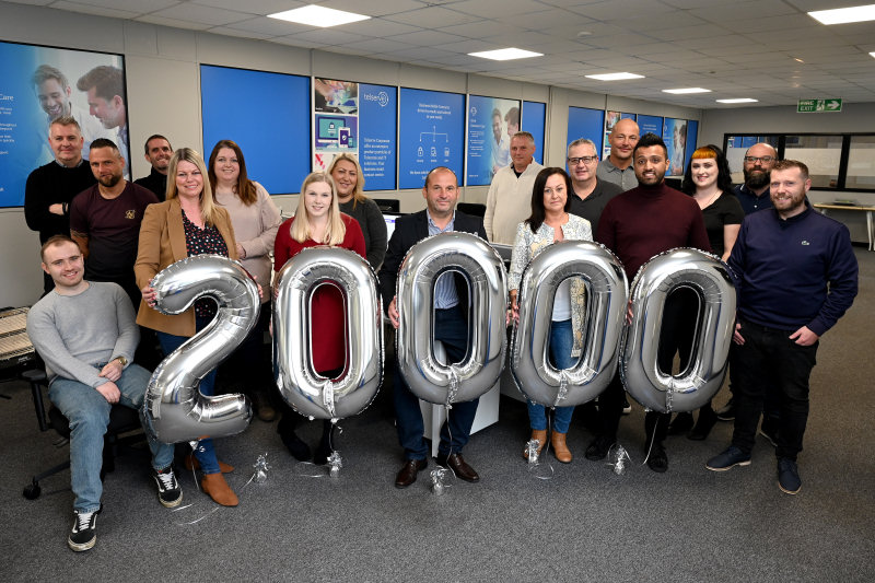 The Telserve team celebrates setting their 20,000 customer live