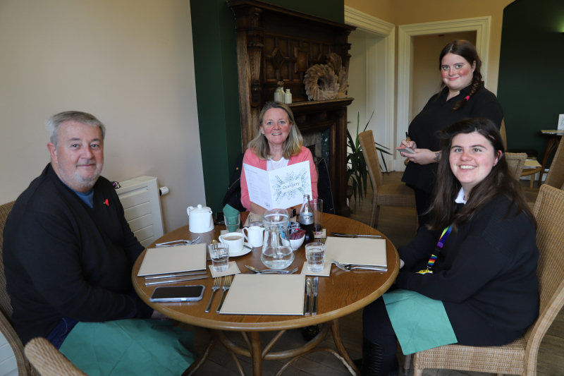 Student, Libby Grigg, visited the Orangery Restaurant with her parents and is seen being served by Jodie