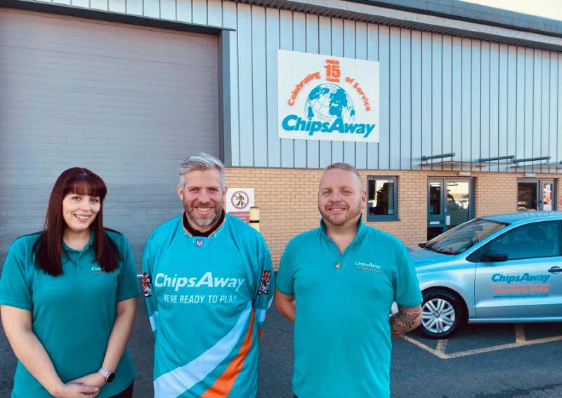 Kirsty McLafferty and Steve Williams at ChipsAway in Telford with Telford Tigers Ice Hockey player Ricky Plant (centre).