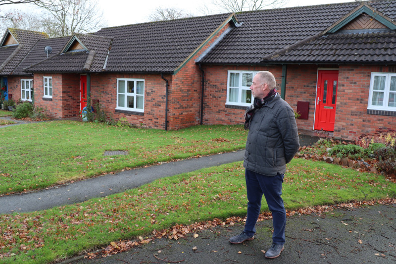 John Green, Shropshire Rural Housing Association’s chief executive surveying the work at Mary Webb Close in Pontesbury