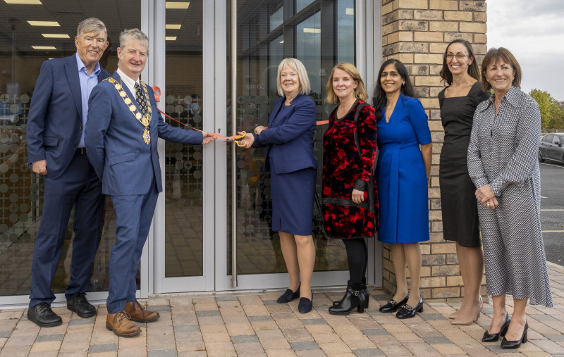 Councillor Julian Dean pictured with Doug and Dame Mary Perkins, founders of Specsavers, and the team at Newmedica Shrewsbury