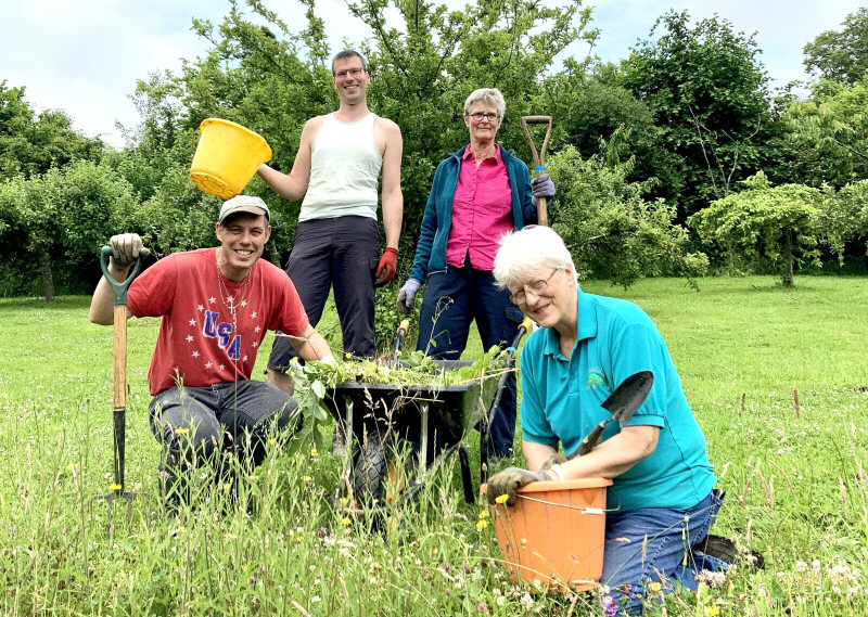 Volunteers at the community orchard