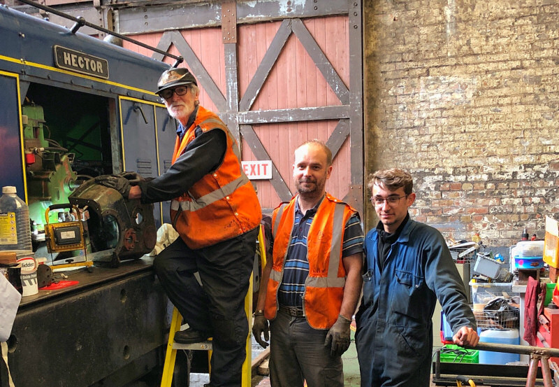 John, Paul and Andrew who are three generations of the same family volunteering at the railway