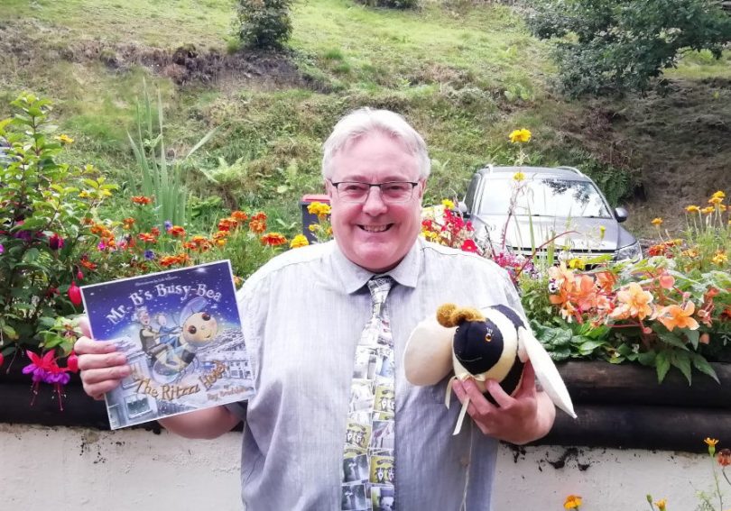 Author Roy Bradshaw with his latest book