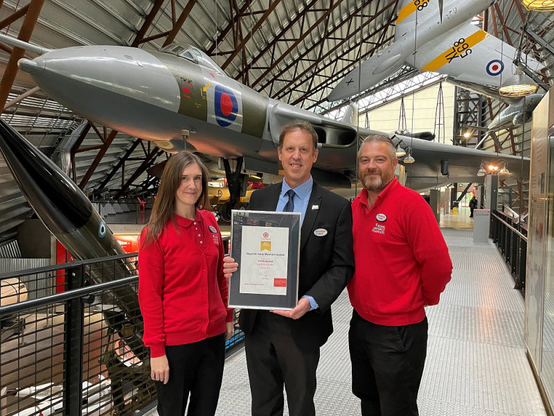 RAF Museum Operations Manager Alan Edwards (Centre) with Visitor Experience Assistants Louise Hammond and Charlie Cooper