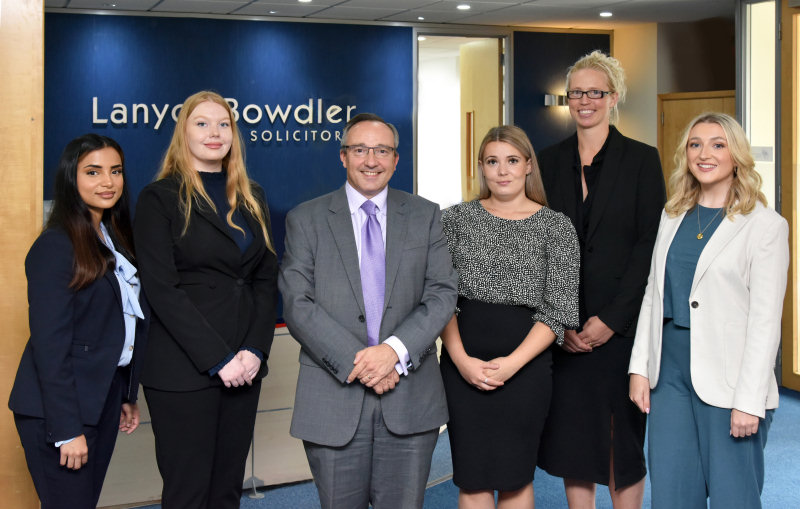 Afsarah Haque-Hassan, Emily Mouland, Leanne Jones, Stephanie Merrill and Sarah Gallagher with Brian Evans (centre)