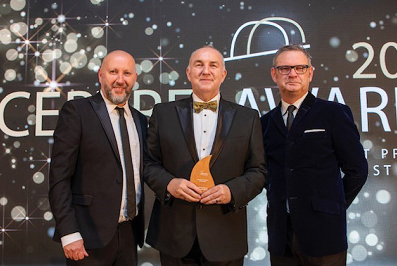 Kevin Lockwood (centre) with his award