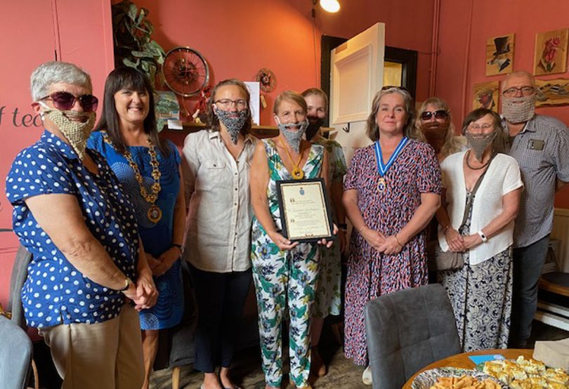 Mandy Thorn, the High Sheriff of Shropshire, and Cllr Anne Wignall, Ellesmere Town Mayor, with incognito members of Ellesmere Yarn Bombers