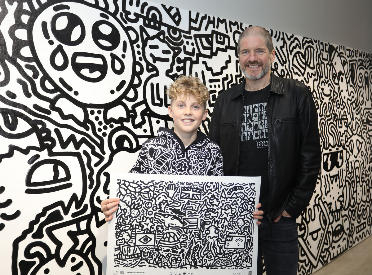 Pictured is Joe Whale (Doodle Boy) with British comic artist Charlie Adlard at the launch in Shrewsbury. Photo: Phil Blagg Photography