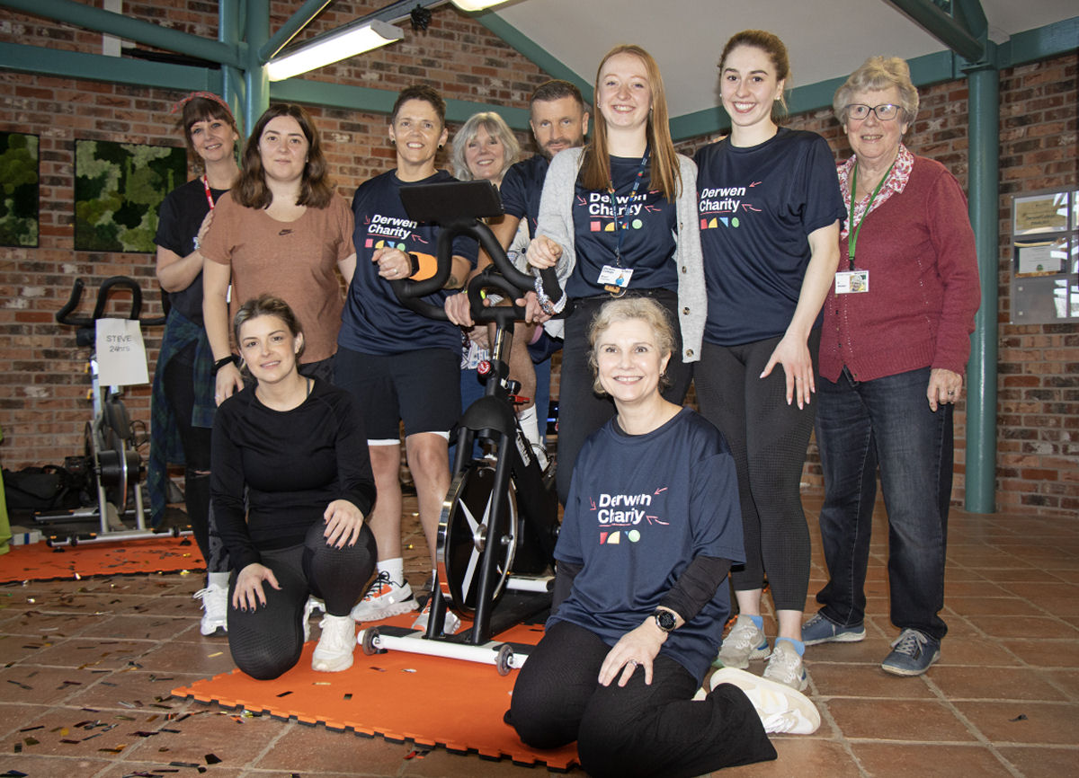 Doodle Deb, Tia Hughes, Kelli Jones, Principal Meryl Green, Steve Evans, Meg Charman, Ellie Southward, K Kimber. Front Olyvia Evans and Eluned Watson. Dream Team #Team24 Kelli and Steve pedalled for the entire 24 hours.