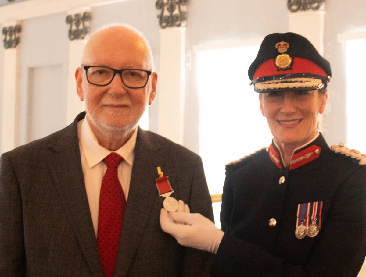 Richard Fowler BEM receives his medal from Anna Turner, the Lord-Lieutenant of Shropshire. Photo: Shropshire Council.