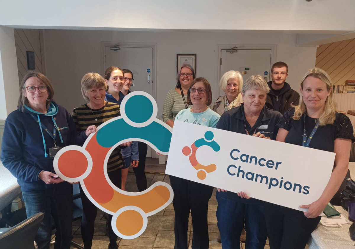 Miranda Ashwell far left and Kerry Morgan far right from Lingen Davies with staff and volunteers at The Ark