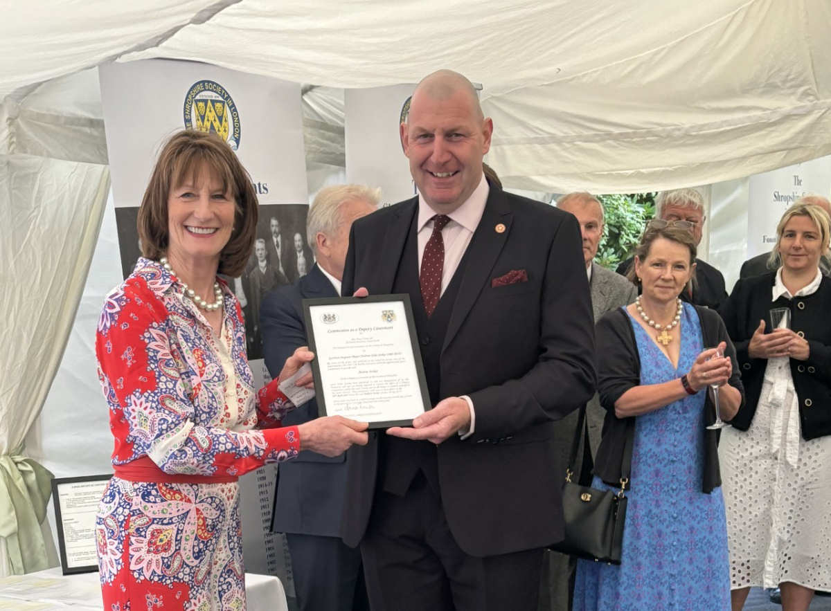 Mrs Anna Turner, the Lord-Lieutenant of Shropshire, presents Major Andrew John Stokes with his commission