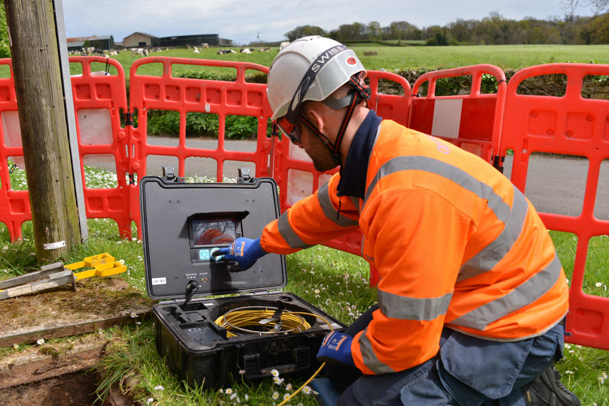 An Openreach engineer works on connecting properties to fibre internet services