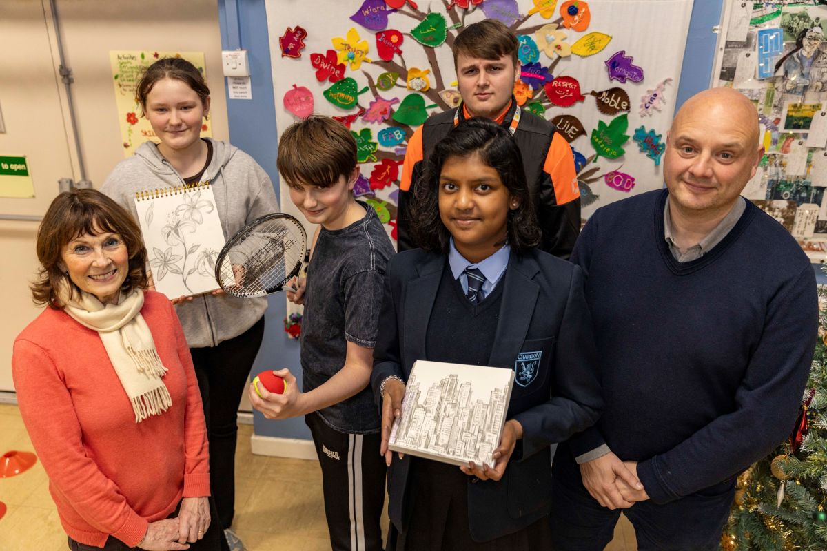 Councillor Lee Carter, (Lab) Leader of Telford & Wrekin Council with Councillor Angela McClements, (Lab) Telford & Wrekin Council’s Cabinet Member for Leisure, Tourism, Culture & the Arts and ward councillor for Arleston and College, with some of the children at Arleston Youth Club. Photo: Telford & Wrekin Council