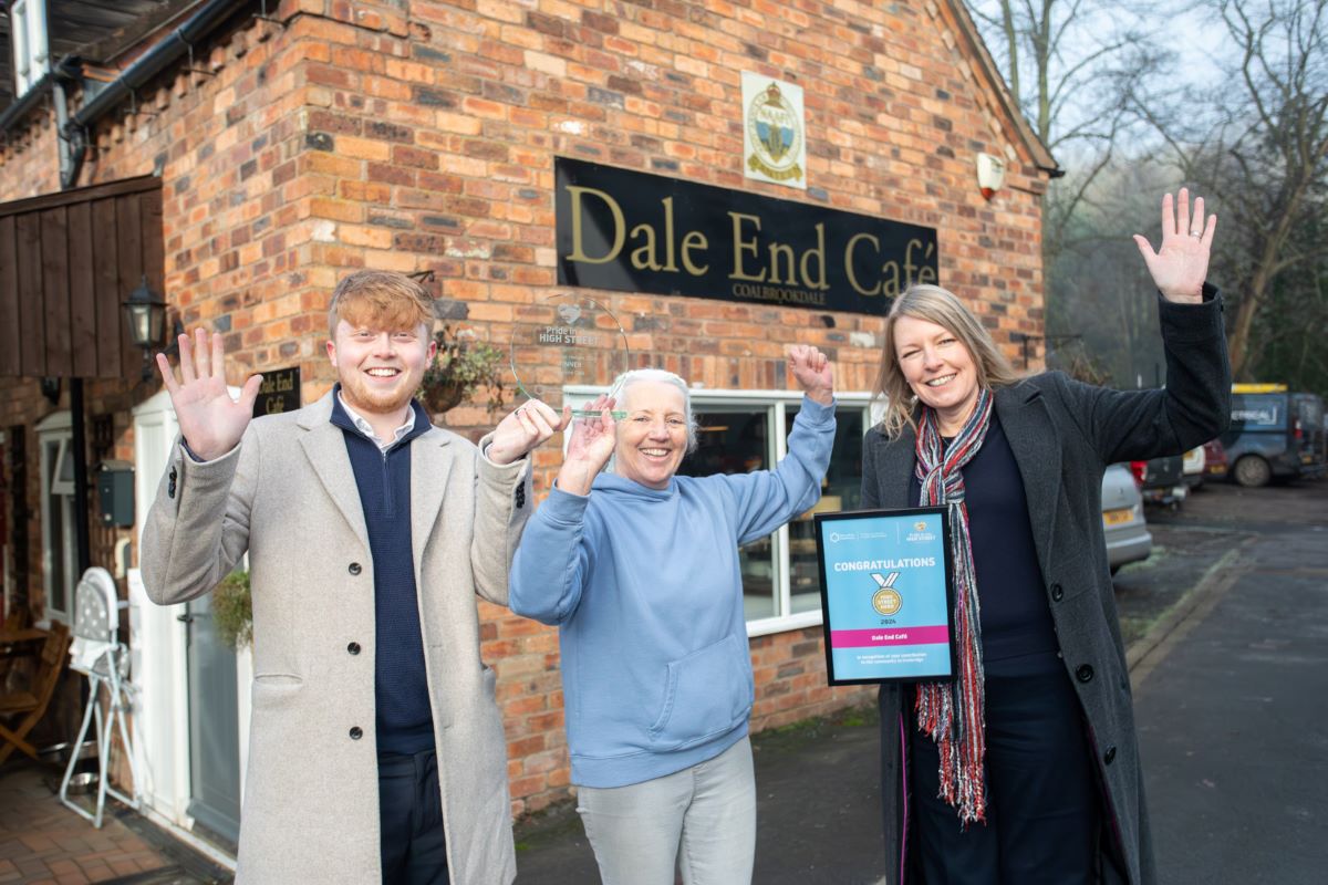 Sharon Shenton, centre, owner of Dale End Café in Coalbrookdale receives a High Street Heroes award from Councillor Ollie Vickers and Councillor Carolyn Healy. Photo: Telford & Wrekin Council