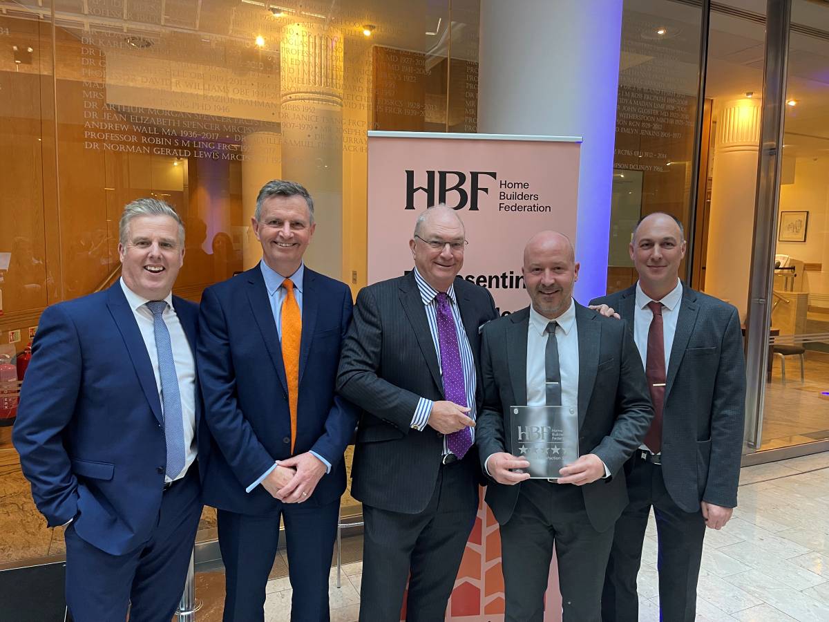 Paul Newton (Customer Care Manager), Colin Cole (Chief Executive), Danny Tunstall (Construction Director), and Steve Bishop (Site Manager) from Lioncourt Homes with Stewart Baseley (Chairman of the Home Builders Federation)