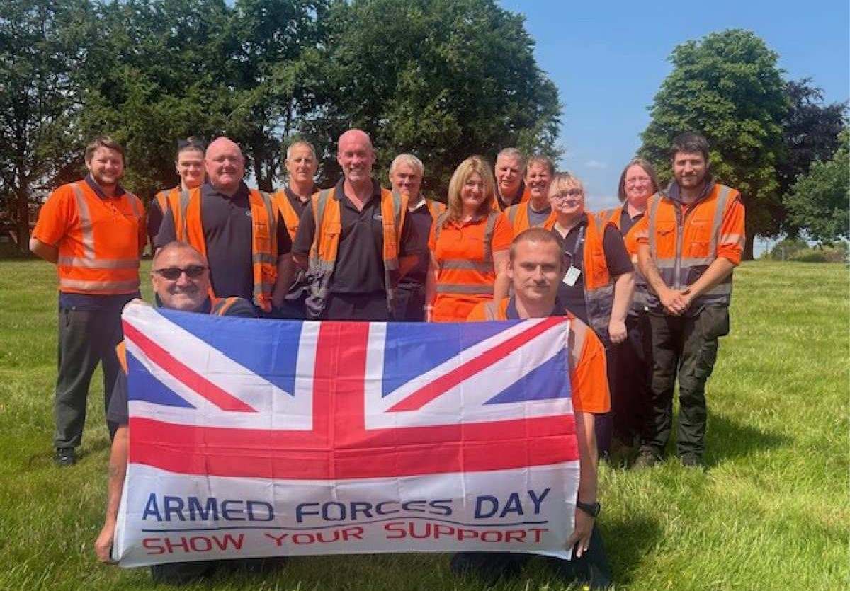 The Armed Forces Day flag is raised at Nesscliff Training Camp near Shrewsbury