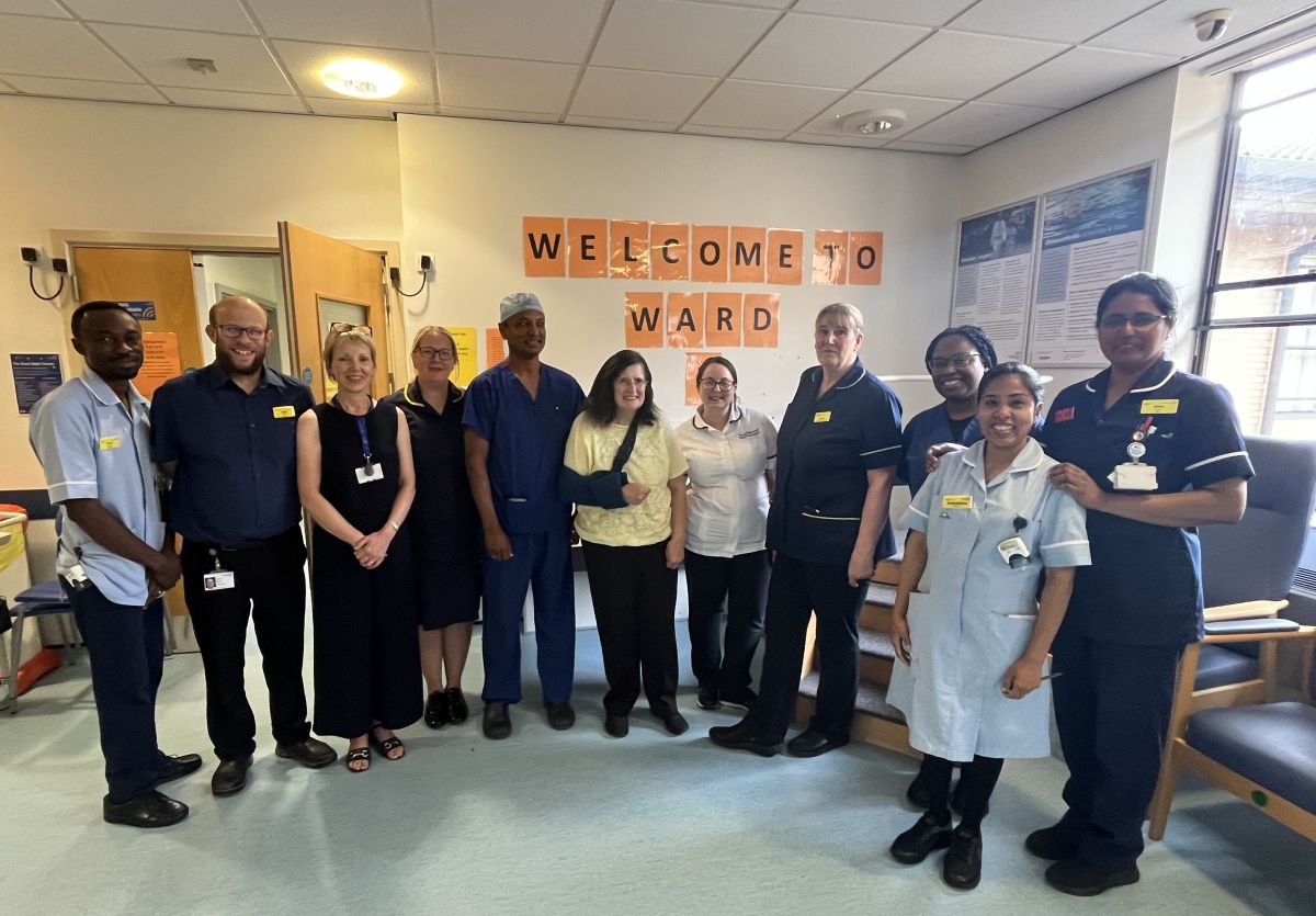 Maureen Drakeley, pictured with the team and her surgeon