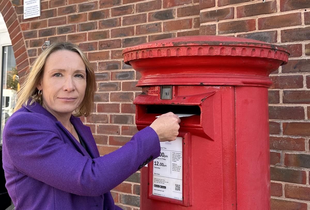 Helen Morgan MP outside Wem Post Office
